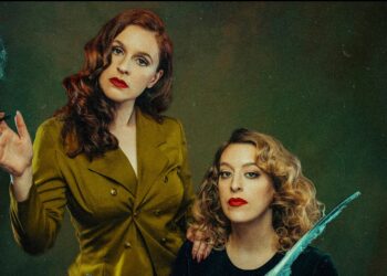 a picture of comedy duo Norris & Parker shot in a femme fatale style