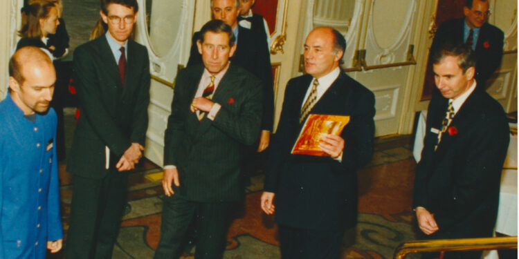 Paul Gregg to the right, next to King Charles III