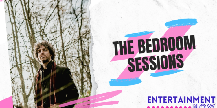 A graphic for the entertainment now YouTube series The Bedroom Sessions, which includes pink and blue graphic scribbles and a photo of singer songwriter Demian Dorelli, he has short curly dark hair and is stood in some woods wearing a dark coat and a red scarf